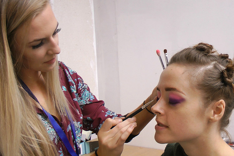 Make-up artist Charlotte Maclaine getting Lauren Ashley Carter ready for her first day on set as Martha Swales