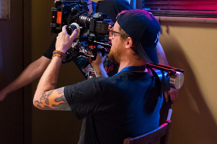Cinematographer Mat Johns at work on set for Once Btten...