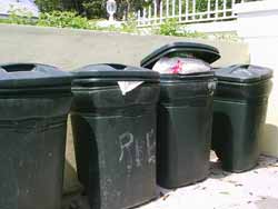 Over filled Bahamian trash cans