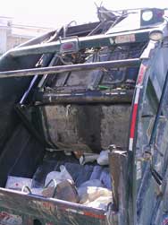 Rear of Bahamian trash collection vehicle