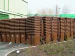Another huge stack of brown wheelie bins