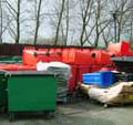Green, red and blue wheelie bins