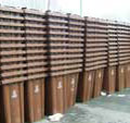 Yet another stack of brown wheelie bins