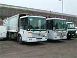 Front view of two bin lorries